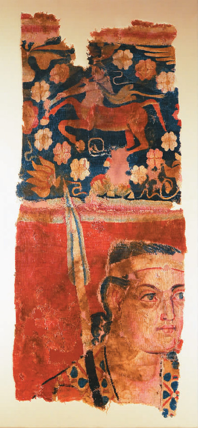 漢代藍(lán)地人首馬身紋緙毛布。 　　中國(guó)國(guó)家博物館供圖