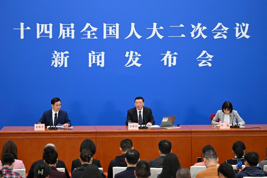 3月4日，十四屆全國人大二次會議在北京人民大會堂舉行新聞發(fā)布會。大會發(fā)言人婁勤儉就大會議程和人大工作相關(guān)問題回答中外記者的提問。 新華社記者 牟宇 攝