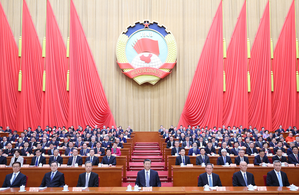 3月4日下午，中國人民政治協(xié)商會議第十四屆全國委員會第二次會議在北京人民大會堂開幕。習近平等黨和國家領(lǐng)導人到會祝賀。 新華社記者 鞠鵬 攝