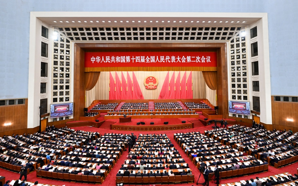 3月8日，十四屆全國人大二次會議在北京人民大會堂舉行第二次全體會議。 新華社記者 張領(lǐng) 攝
