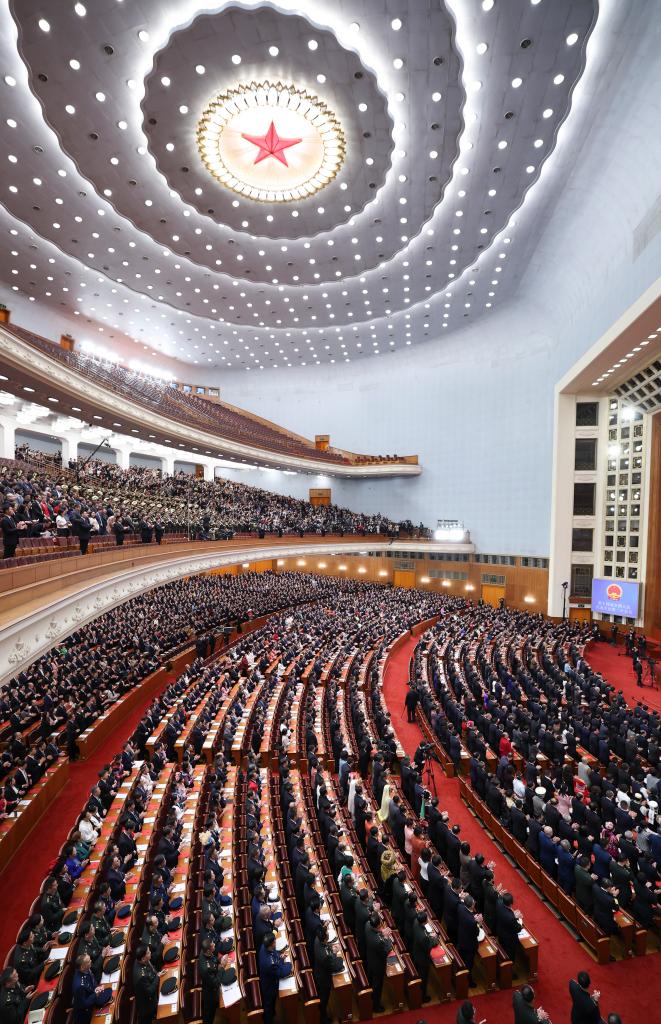 3月11日，第十四屆全國人民代表大會第二次會議在北京人民大會堂舉行閉幕會。新華社記者 丁林 攝