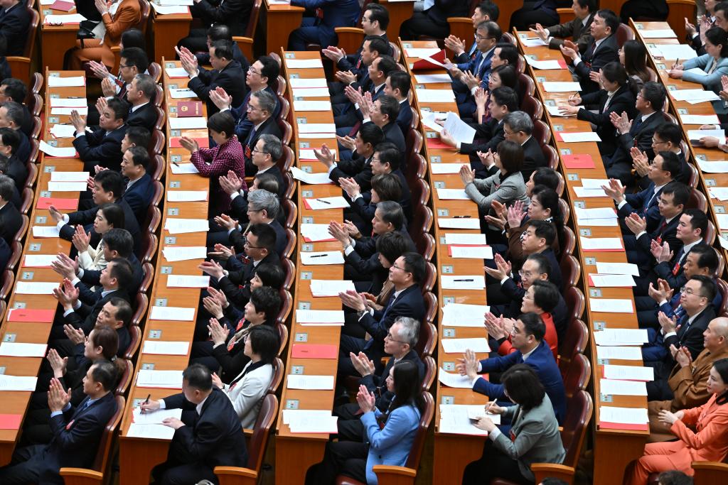 3月11日，第十四屆全國人民代表大會第二次會議在北京人民大會堂舉行閉幕會。新華社記者 李鑫 攝