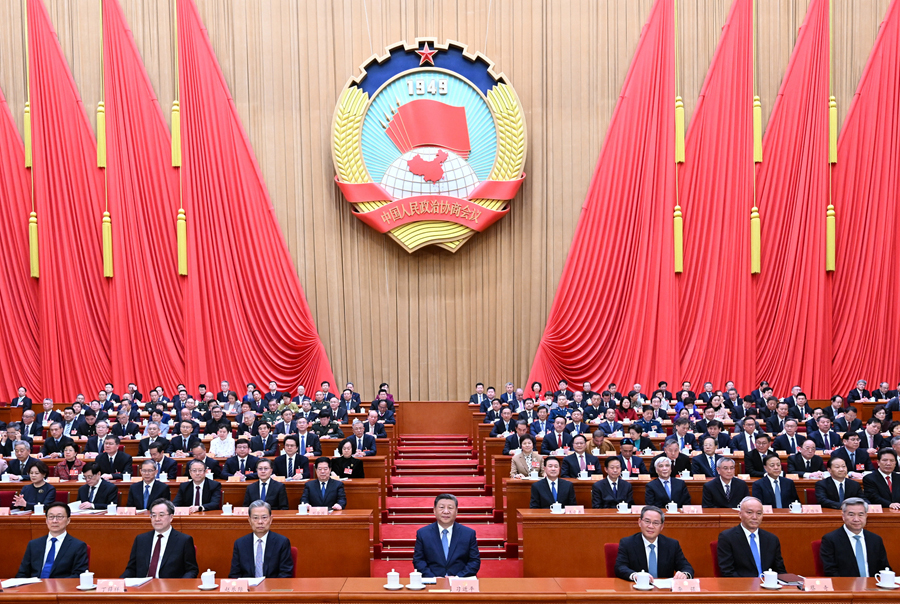 3月4日下午，中國人民政治協(xié)商會議第十四屆全國委員會第三次會議在北京人民大會堂開幕。這是習(xí)近平、李強、趙樂際、蔡奇、丁薛祥、李希、韓正在主席臺就座。 新華社記者 謝環(huán)馳 攝